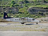 207 Plane At Jomsom Airport We quickly trekked back down from the ridge at 4500m to Yak Kharka and had lunch, and then descended to Marpha. The 2000m descent was brutal on the knees. It was a brief one hour trek from Marpha to Jomsom, where I flew out to Pokhara and Kathmandu.